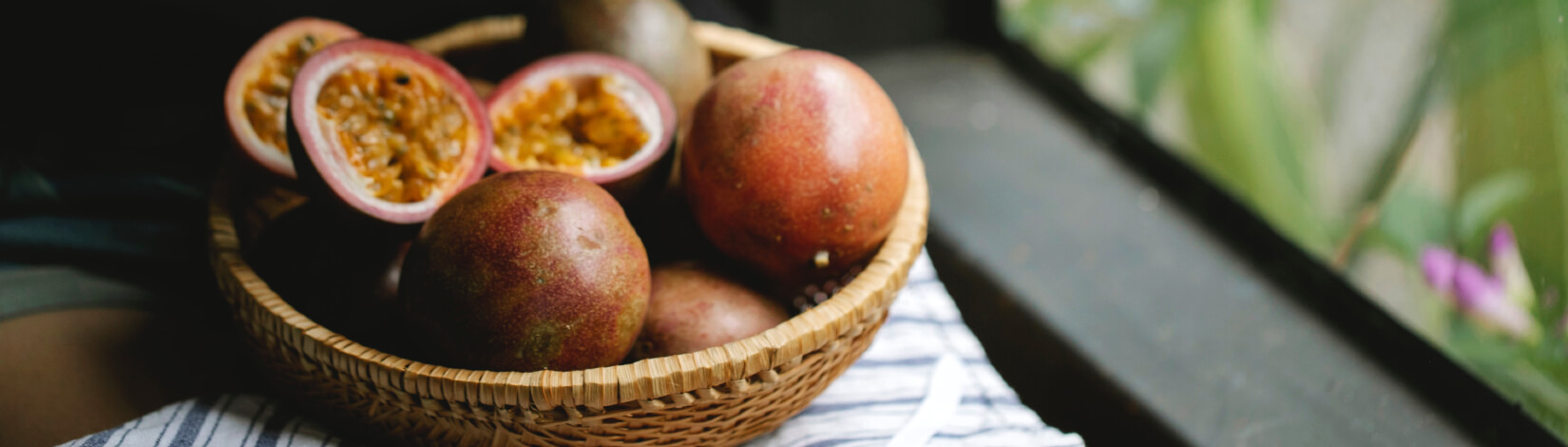 close up of passionfruit in a bowl